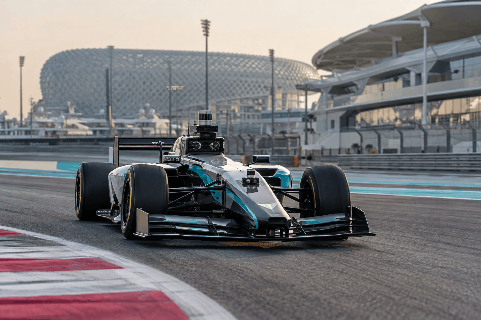 AI-generated illustration: Driverless open-wheel racing car with autonomous sensors at Yas Marina Circuit